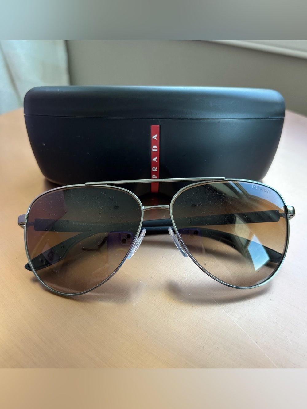 Prada Aviator PS 52WS Sunglasses — Silver Frame with Brown Gradient Lenses